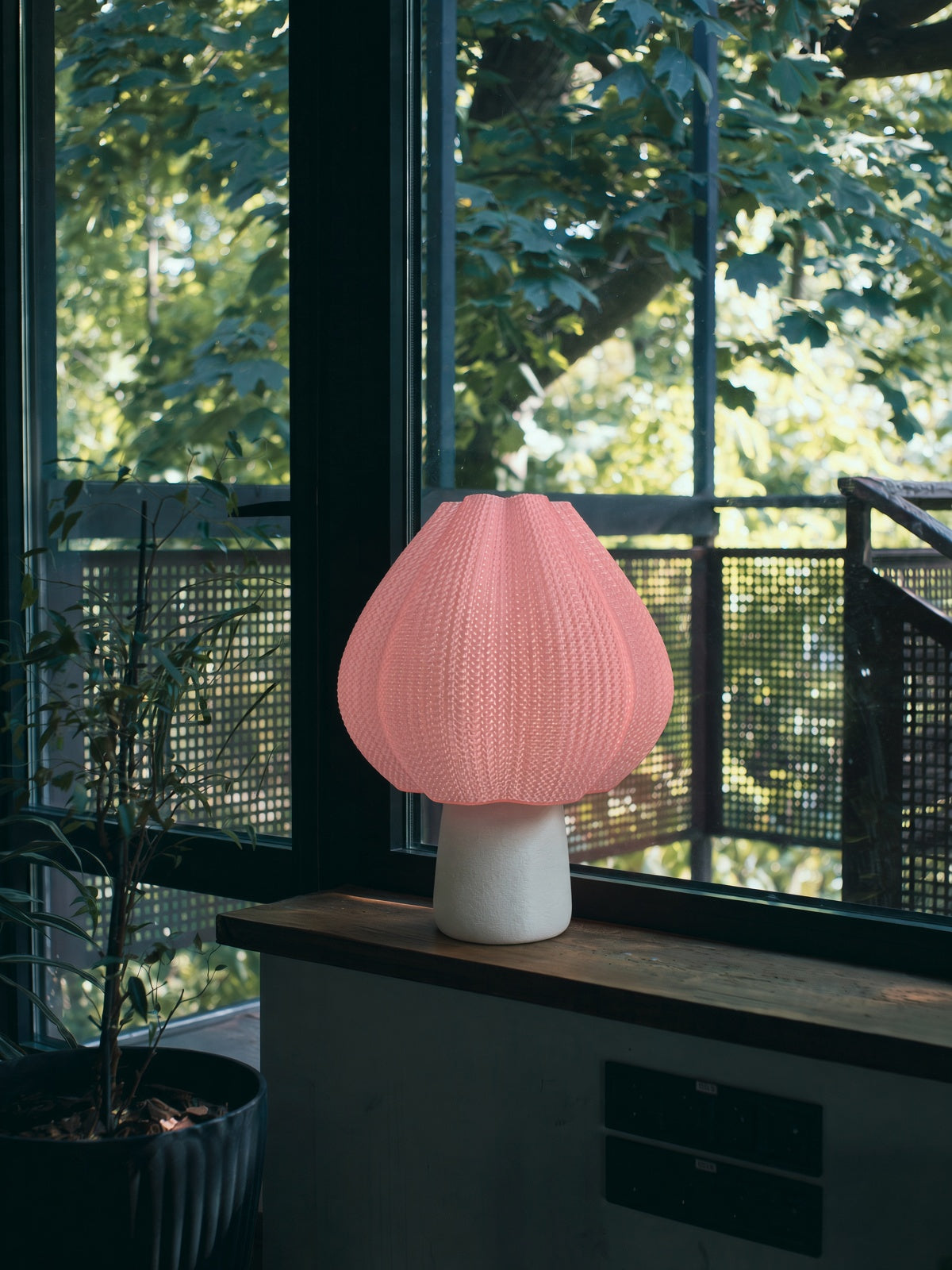 Table lamp on a shelf, off in daylight